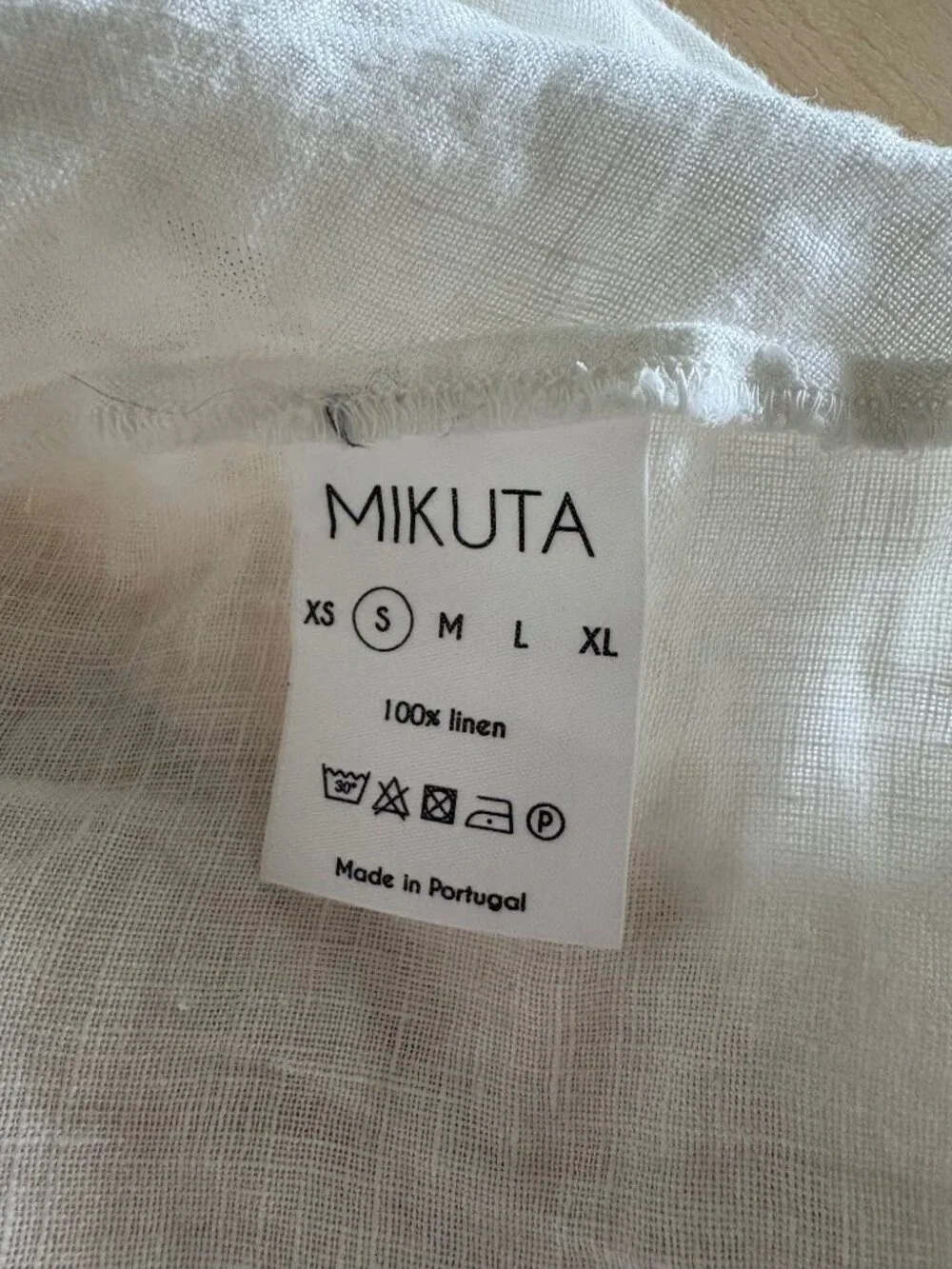 Mikuta white shortsleeve linen wrap shirt Women's small